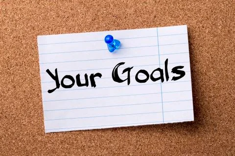 YOUR GOALS - teared note paper  pinned on bulletin board Stock Photos