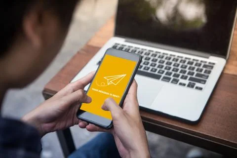 Your message is sent on smartphone screen concept Stock Photos