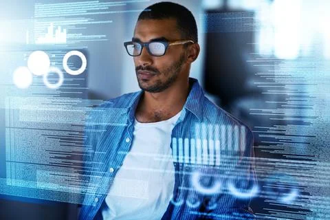 Youre looking at the code master. a serious computer programmer working on new Stockfoto's