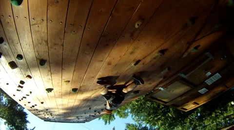 Youth climbing a wall. Stock Footage 33789074