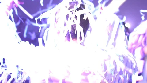 Youth dancing in a nightclub, fun, throw decoration. Background, slow motion Stockbeeldmateriaal 129683161