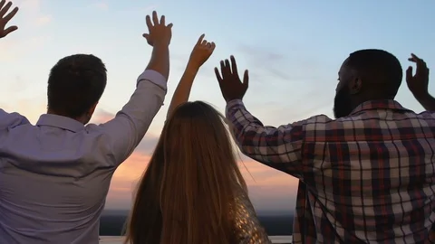 Youth having fun dancing at open-air terrace and looking at sunset, back-view Stock-Footage 117196798