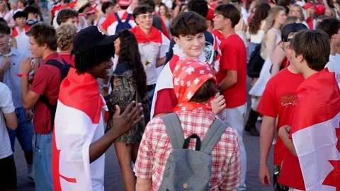Youth hugging and chatting with each other, Kelowna BC Canada, July 1, 2025 Stockbeeldmateriaal 312584370