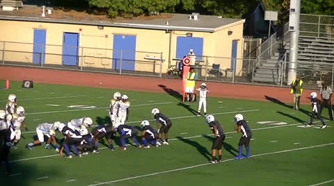 Youth Quarterback Pass To Receiver Stock-Footage 25450511