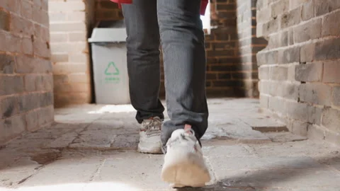 Youth wanders ancient pathway gracefully. Young child meanders through historic 스톡 동영상 330146293