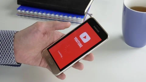 The Youtube application is loaded for a very long time Stock Footage 99834320