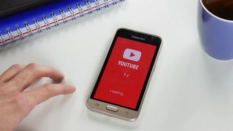 The Youtube application takes a very long time to load Stock Footage 99837584