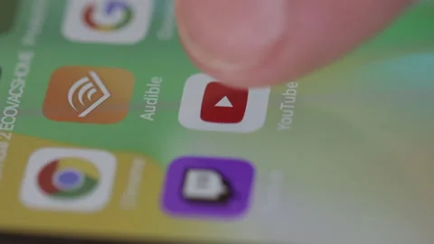 Youtube icon typing and scroll. Close up shot of hand on social network. Macro Stock Footage 170562361