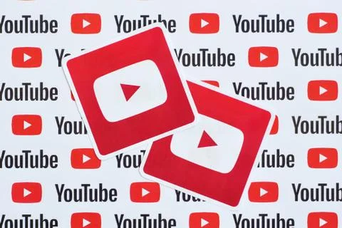 Youtube logo sticker on pattern printed on paper with small youtube logos and Stock Photos