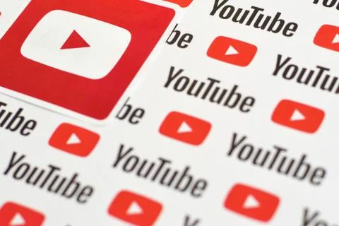 Youtube logo sticker on pattern printed on paper with small youtube logos and Stock Photos