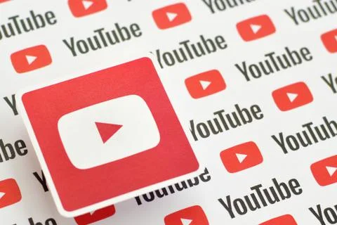 Youtube logo sticker on pattern printed on paper with small youtube logos and Stock Photos