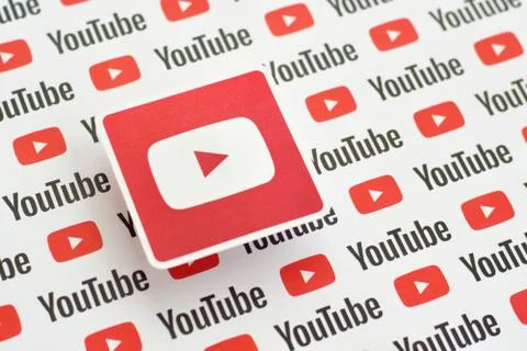 Youtube logo sticker on pattern printed on paper with small youtube logos and Stock Photos