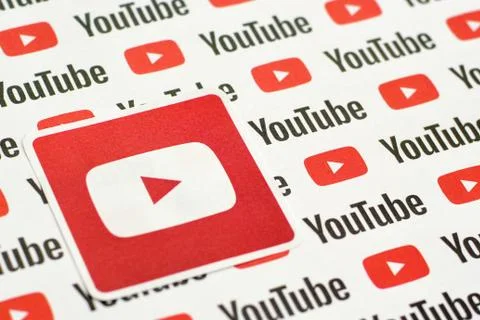 Youtube logo sticker on pattern printed on paper with small youtube logos and Stock Photos