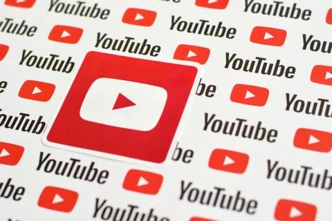 Youtube logo sticker on pattern printed on paper with small youtube logos and Stock Photos