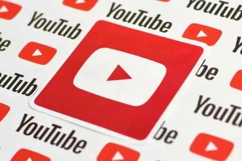 Youtube logo sticker on pattern printed on paper with small youtube logos and Stock Photos