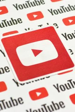 Youtube logo sticker on pattern printed on paper with small youtube logos and Stock Photos