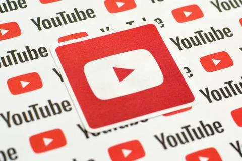 Youtube logo sticker on pattern printed on paper with small youtube logos and Stock Photos