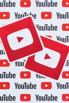 Youtube logo sticker on pattern printed on paper with small youtube logos and Stock Photos