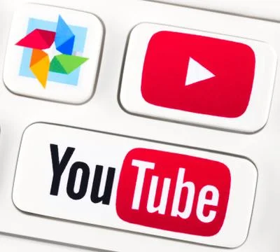 Youtube logotypes on a keyboard buttons Stock Photos