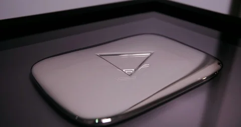 YouTube silver play button award, close up, rotating counter clockwise Stock Footage 119121855