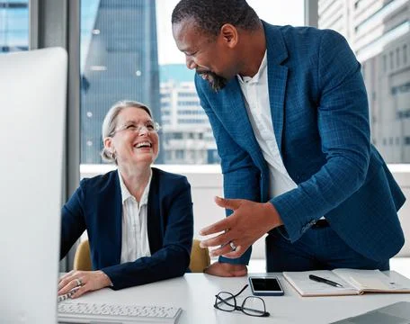 Youve got the best approach to problems. Shot of two businesspeople having a  Foto stock