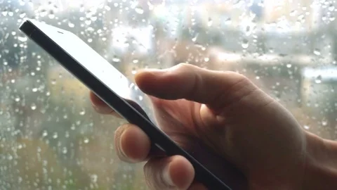 Ypung man browsing information on smartp... | Stock Video | Pond5