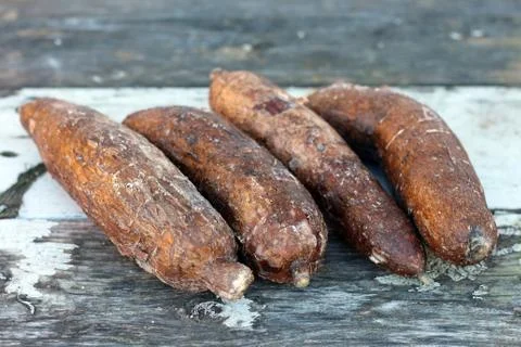 Yucca root on the table Stock Photos