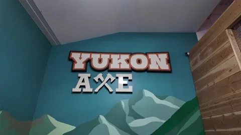 Yukon Axe Throwing Logo Displayed Inside Store Stock Footage 296573871