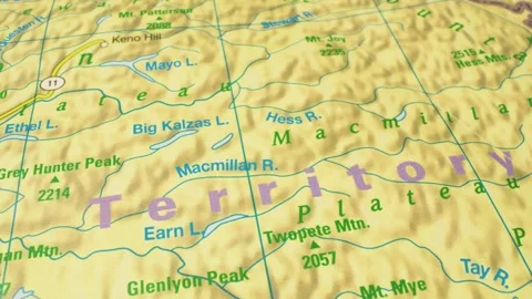 Yukon Territory, Canada – gliding camera movement over a physical map Stock Footage 345784587