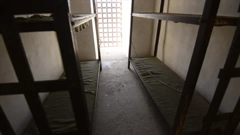 Yuma Territorial Prison cell with 4 bunks and barred door Stock Footage 166171972
