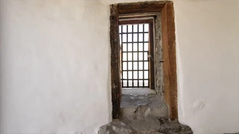 Yuma territorial prison, passage way to cell with bars Video stock 166171995