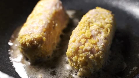 Yummy Schnitzel deep fried in olive oil Stock Footage 150922145