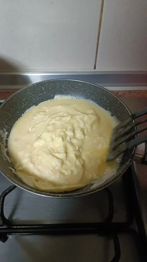 Yummy scrambled fresh eggs Stock Footage 322170253