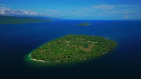 Yuo Island remote pristine untouched tropical Mushi island coastline village Stock Footage 317740198