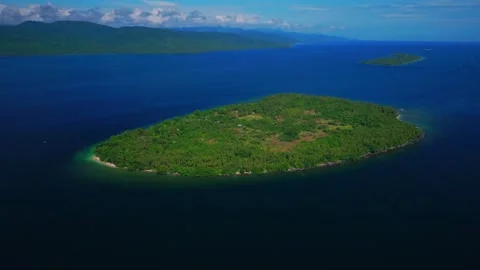 Yuo Island remote pristine untouched tropical Mushi island coastline village Stock Footage 317805796