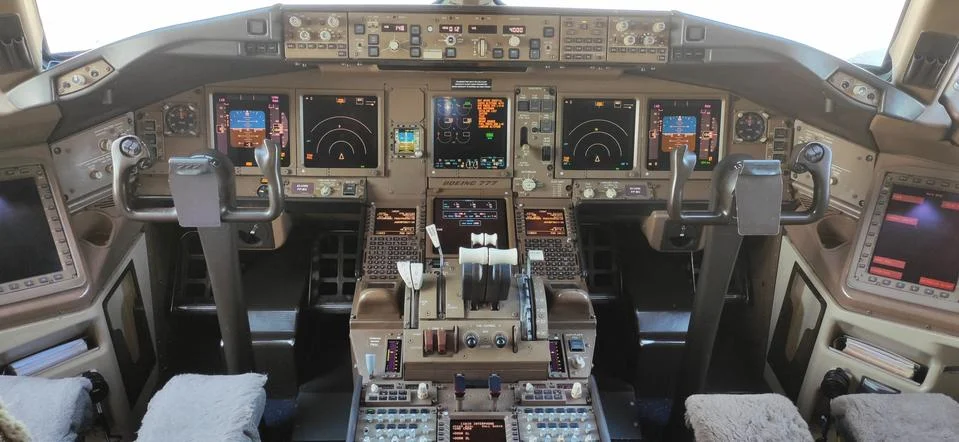 Yuzhno-Sakhalinsk, Russia, February 21, 2020. Boeing 777 pilots cockpit with Stock Photos