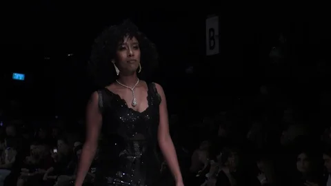 Yvel, Turning the Table campaign and celebrities present catwalk on the runway Stock Footage 87663076