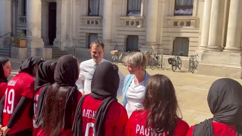 Yvette Cooper plays friendly cricket match with exiled Afghan women’s team Video stock 338124983