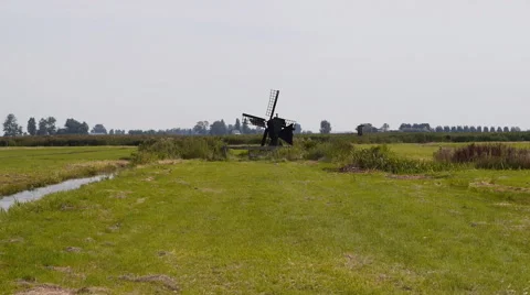 Zaanse Schans Netherlands small windmill. Iconic landmark in the north Stock Footage 60981051