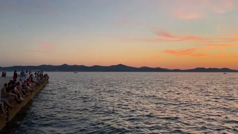 Zadar promenade at sunset Vidéo 163664503