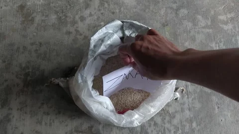 Zakat Message on Rice Sack Islamic Donation Concept Stock Footage 328469258