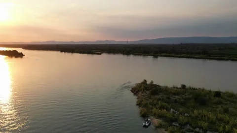 Zambezi river drone hyperlapse around boat on sunset Видео 219836564