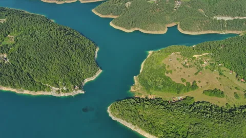 Zaovinsko Lake surrounded by forested hills and mountain in Serbia Stock Footage 344743473