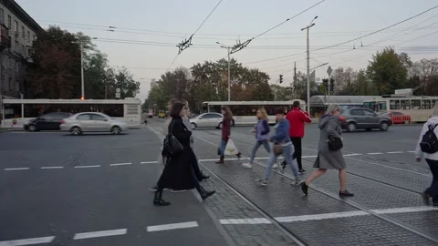 ZAPOROZHYE, UKRAINE - OCTOBER 25, 2020: A group of young people walk down the Stock Footage