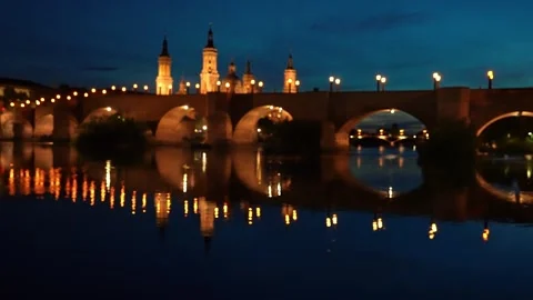 Zaragoza old bridge at night Stock Footage 243560874