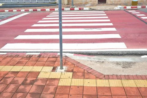 Zebra cross with red background Stock Photos
