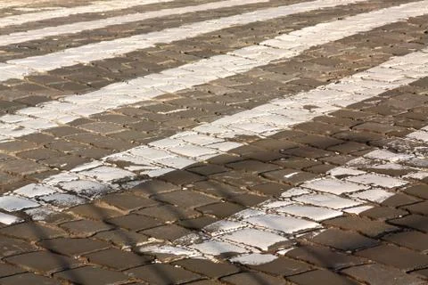 Zebra pattern pedestrian crossing on old cobblestone Stock Photos