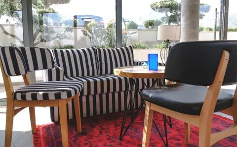 Zebra sofa in cafe Stock Photos