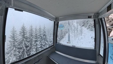 Zell am See, Austria - March 18, 2026: Gondola Ride Through Alpine Forest Stock Footage 345416249
