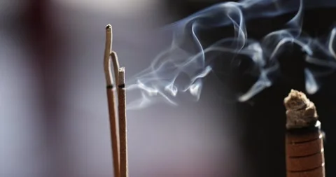 The Zen-like atmosphere of incense in the temple Stock Footage 329874081